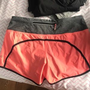 bright pink/orange shorts